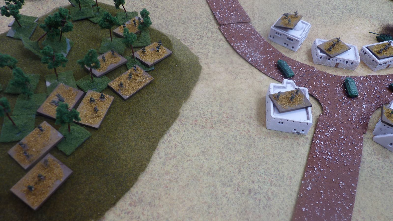Turkish infantry commence a firefight with the Soviets in the village